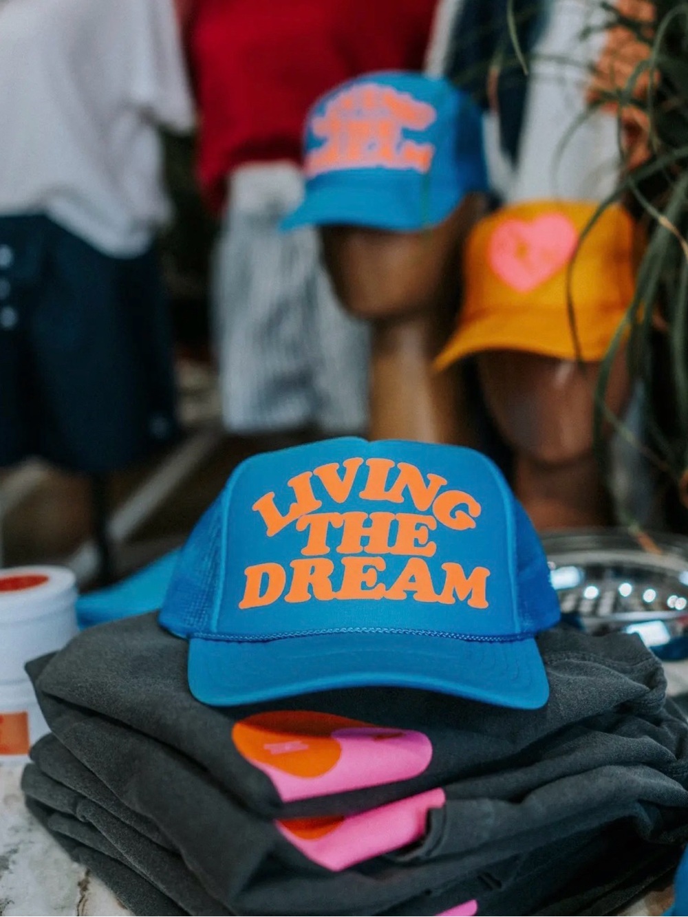 Blue Trucker Hat with orange "Going Nowhere Fast" Text